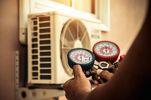 Professional Hvac technician working in Elmo, TX